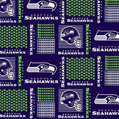 the seattle football team is depicted in this blue and green fabric with white letters on it