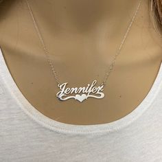 Description: 925 Sterling Silver Name Plate Heart Necklace - Jennifer Item No.: C01 Metal Type: .925 Sterling Silver With Stamped 925 Finish: High Polish Measurement: 16" - 18 Inches. Pendant: 1.5" X 0.75" Brand New With Box Silver Name Jewelry - Gift For Mom, Silver Name Jewelry As Gift For Mom, Personalized Sterling Silver Jewelry For Mom, Personalized Sterling Silver Jewelry Gift For Mom, Personalized Silver Jewelry As A Gift For Mom, Silver Heart Cut Jewelry For Mother's Day, Personalized Heart Necklace In Sterling Silver, Personalized Silver Fine Jewelry, Custom Name Heart Pendant Jewelry For Anniversary