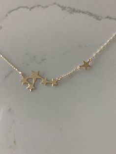 14k Solid Gold Multi Stars Necklace, Dainty Necklace, Layering Necklace, Stars Necklace, Constellation Necklace, REAL GOLD -------------------------------------------------- ♦ --------------------------------------------------The beautiful Stars Necklace, is part of our new collection! It can help dress up any wardrobe and is a comfortable length for wear. If you are looking for a gift for a dear loved one, think of this Necklace - we can help you get it in time for any special event.♦ Materials Star Jewelry Gold, Star Necklace Aesthetic, Necklace Real Gold, Beautiful Stars, Chain Layering, Necklace Measurements, Stars Necklace, Jewellery Sketches, Constellation Necklace