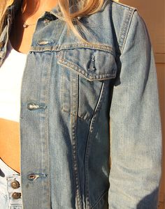 Vintage Levi's jacket in a light blue denim. Two chest pockets. Size XS Measurements - 30"(77cm) bust - 21"(54cm) sleeve length - 20" (51cm) jacket length. Material - Denim. Condition - Excellent, red tab to front pocket has been cut, reflected in our price. Handpicked, repaired and ready to wear. This is an original vintage item, not new and minor signs of wear & age are expected, we will highlight any major flaws. Model is a UK 6/8 and is 5'7" tall Fitted Washed Blue Denim Jacket With Buttons, Levi's Light Wash Cotton Denim Jacket, Levi's Light Wash Denim Jacket With Pockets, Vintage Levi’s Button-up Denim Jacket, Levi's Medium Wash Cotton Denim Jacket, Levi's Light Wash Long Sleeve Denim Jacket, Levi's Long Sleeve Light Wash Denim Jacket, Levi's Fitted Long Sleeve Denim Jacket, Vintage Light Wash Denim Jacket With Buttons