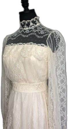 Long Sleeve Delicate Lace Dress For Formal Occasions, Long Sleeve Delicate Lace Wedding Night Dress, Long Sleeve Lace Dress With Fitted Bodice, Long Sleeve Delicate Lace Dress For Wedding Night, Lace Dress With Long Sleeves And Fitted Bodice, Lace Wedding Dress With Lace Cuffs, Ceremony Dress With Lace Sleeves, Elegant Long Sleeve Wedding Dress With Lace Bodice, Long Sleeve Lace Dresses For Ceremony