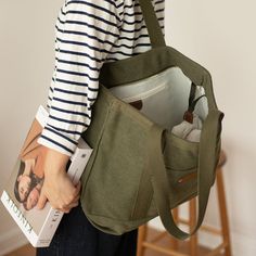 Overview： Design: Mens Army Green Canvas Large Tote Bag Canvas Handbag Canvas Tote for Men WomenIn Stock: Ready to Ship (2-4 days)Include: Only BagCustom: NoColor: Army GreenLeather: CanvasMeasures: 43cm x 34cm x 15cm Weight: 0.45kgSlots: 1 main slotAccessories(option): NoneStyle: Mens Army Green Canvas Large Tote Bag Canvas Handbag Canvas Tote for Men WomenVery durable (At least 5 Years) and it should last a life time Description: The Mens Army Green Canvas Large Tote Bag is a functional and st Functional Green Canvas Bag With Pockets, Casual Shoulder Bag For Daily Use With Canvas Lining, Green Everyday Satchel With Zipper Pocket, Everyday Green Satchel With Zipper Pocket, Khaki Canvas Bag For Travel, Outdoor Canvas Shoulder Bag With Zipper Pocket, Green Canvas Bag With Zipper Pocket, Green Canvas Bags With Zipper Pocket, Khaki Canvas Satchel For Daily Use