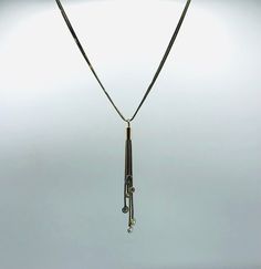 *About me: 925 silver necklace. Veronese tassel necklace with dangling cubic zirconia gem stones. tantalizing tassel neck treasure! *Size: Approx. length 46cm / 18 inches , width 0.4cm / 0.15 inches at widest, tassel length 8.5cm / 3.34 inches *Weight: Approx. 11.8 grams *Hallmark: Italy, 925 *Sponsor: DQCZ, V (Diamonique Cubic Zirconia and Veronese)  *Age: Vintage *Condition: Good vintage condition *Gift boxed to your door ** A vintage item that has been pre-loved, history of wear appropriate t Elegant Pendant Necklaces With Dangling Charms, Silver Necklace With Detachable Dangle Pendant, Silver Dangle Necklace With Detachable Pendant, Elegant Lariat Jewelry With Dangling Beads, Elegant Silver Chain Necklace For Celebration, Elegant Dangle Tassel Necklace, Elegant Silver Chain Drop Necklace, Elegant Adjustable Drop Necklace With Dangling Beads, Luxury Dangle Lariat Necklace