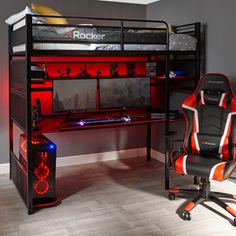 a gaming room with a desk and chair