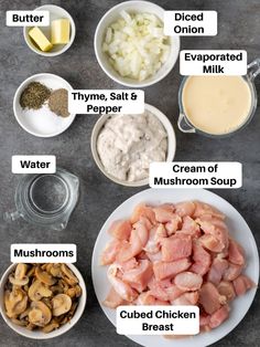 the ingredients to make mushroom soup are shown on a gray table with white bowls and spoons