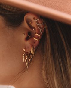 ~ Made with thick gold plated on sterling silver ~ Nickel Free & Lightweight, perfect for everyday wear ~ 1 loop: 28 mm ~ 2 loop: 9 mm ~ 3 loop: 14 mm ~ Sold as 1 Piercing Gold Ear, Golden Earrings Aesthetic, Piercing Stack, Fire Earrings, Piercing Inspo, Beauty Magic, Earrings Aesthetic, Flame Design, Golden Earrings