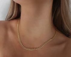 Miami Cuban Chain Necklace | 18k Gold Filled Necklace | Cuban Link Chain | Gold Cuban Curb Chain | Gold Cuban Choker | Medium Thick Chain Timeless, light & comfortable gold jewelry to wear all day, everyday. Stunning piece to wear with layers, charms, or even by itself! Details: Premium quality 18k Gold Filled Materials: Gold on Brass Measurements: Width 5mm - 14 inches long (choker) - 16 inches long - 18 inches long Nickel & Lead Free Hypoallergenic Cheap Alloy Gold Chain Necklaces, Luxury Everyday Curb Chain Necklace, Cheap Everyday Necklaces With Curb Chain, Cheap Gold Chain Necklace For Birthday, Cheap Gold Necklaces With Box Chain, Affordable Gold Chain Choker Necklace, Cheap Gold Clavicle Chain Choker, Cheap Alloy Necklaces With Gold Chain, Cheap Alloy Necklace With Gold Chain