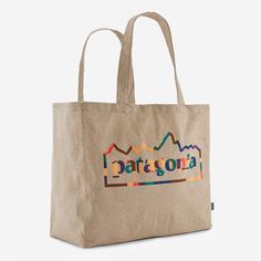 This 100% recycled tote is made of scraps from our Uprisal styles. By utilizing fabric scraps and recycled bottles, we reduce our reliance on virgin raw materials. Made in a Fair Trade Certified™ factory. | Patagonia Recycled Oversized Tote in Classic Tan - Tote Bags Eco-friendly Upcycled Bags From Recycled Materials, Casual Bags Made Of Recycled Materials, Casual Bags Made From Recycled Materials, Eco-friendly Recyclable Bags Made From Recycled Plastic, Reuse Fabric, Tan Tote Bag, Money Bags, Recycled Tote, Lifestyle Accessories