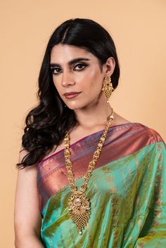 Elevate your fashion game with this stunning Parrot Green Silk Saree. Made with premium quality silk and intricately woven with Copper Zari, it exudes luxury and elegance. Perfect for any occasions, this saree will make you stand out as a true fashion influencer. Elegant Brocade Pre-draped Saree For Designer Wear, Silk Tilla Dupatta For Designer Wear, Designer Kundan Saree, Elegant Jamawar Pre-draped Saree For Eid, Gold Tussar Silk Designer Sets, Elegant Pre-draped Jamawar Saree With Pallu, Elegant Art Silk Lehenga With Tilla Detail, Elegant Art Silk Lehenga With Tilla, Designer Gold Anarkali Set In Katan Silk