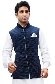 Vastramay brings to you this Stylish yet Comfortable Men Navy Blue Men Digital Print Velvet Modi Jacket. Adorn it for a perfect Classy and Trendy look. Pair it with a juti or a mojari for the Royal look. Product Features :  Top Color: Blue Top Fabric: Velvet Lining Material: Cotton Satin Product Type: Modi Nehru Jacket Hemline: Straight Fabric Purity: Pure Placket: Button Placket Collar: Mandarin Collar Sleeves: Sleeveless Indo Western For Men, Sherwani For Men, Nehru Jacket, Navy Blue Top, Royal Look, Nehru Jackets, Kids Styles, Indian Wedding Outfits, Mens Pajamas