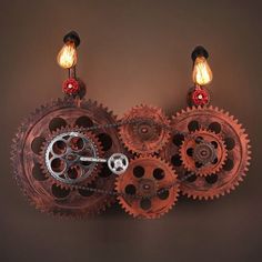 an old clock made out of gears and lights