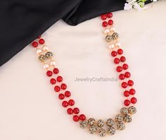 Red Beads Long Victorian Necklace/ Indian Jewelry/ Indian Necklace/ Indian Wedding/ Kundan Necklace/ Kundan Jewelry/ Sabyasachi Jewelry / Kundan long necklace / indian long necklace / indian long pearl necklace High Quality and Craftsmanship All the raw material used in this product is of high quality and is handcrafted with love . Necklace Length: 12 inches Gifting : This necklace and earrings come in  a beautiful gift box , making it an ideal gift for birthday , wedding anniversary or wedding Red Beaded Pearl Necklace For Party, Red Round Beads Pearl Necklace For Wedding, Red Round Beads Mala As Gift, Red Round Beads Mala For Gift, Red Pearl Necklace With Round Beads For Wedding, Red Mala With Round Beads For Gift, Red Gemstone Beads Mala As Gift, Red Mala With Gemstone Beads As Gift, Celebration Pearl Necklace With Gemstone Beads