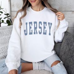 Crafted with a blend of 50% cotton and 50% polyester, these sweatshirts provide an ultimate soft and cozy feel. The Direct-to-Garment printing technique ensures a durable and professionally finished look, without the use of vinyl. ❤️ Opt for a relaxed fit by sizing up, or achieve an oversized look with a sweatshirt two sizes larger than usual. ◦ ◦ ◦ ◦ ◦ Care Instructions ◦ ◦ ◦ ◦ ◦ Maintain quality with cold, inside-out machine wash using mild detergent. Avoid fabric softeners, use non-chlorine b Trendy French Terry Crew Neck Tops, White Varsity Sweater With Relaxed Fit, Trendy French Terry Tops For College, White French Terry Crew Neck Sweats, Casual French Terry Crew Neck Top, White Crew Neck Sweats For College, Fleece Crew Neck Top For Loungewear, White Stretch Crew Neck Sweatshirt, Soft-washed White Sweatshirt For Fall