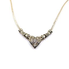 Women's 10k gold diamond heart necklace. The center chevron heart is approximately 35x12mm. Attached is a 10k gold Italian flat curb link necklace. The total length is approved 16". It features 6 diamonds approximately .06 carats. The weight of the piece is 4.6 grams. Yellow Gold Heart Shaped Cubic Zirconia Necklace, Gold Heart Shaped Costume Jewelry Necklace, Luxury Heart-shaped Cubic Zirconia Necklaces, Yellow Gold Heart-cut Cubic Zirconia Necklace, Gold Heart-shaped Costume Jewelry Necklace, Gold Diamond Heart Necklace, Chevron Necklace, Heart Necklace Diamond, Link Necklace