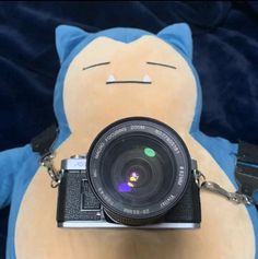 Snorlax holding a camera. Room Plushies, Snorlax Art, Holding A Camera, Junkrat And Roadhog, Art For Kids Hub, Rapunzel And Eugene