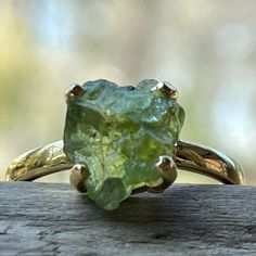 Gemstone: Green Apatite Rough Metal: 18k Gold Vermeil (925 Marked) Ring Size: 9 3.2 Grams Total Weight Brand New, Only Worn For Pictures 18k Gold Vermeil Is Vermeil That Has Been Plated With A Thick Layer Of 18k Gold Over A Sterling Silver Base. After Solid Gold, Gold Vermeil Is The Highest Quality Type Of Gold Tone Jewelry That You Can Buy. It Is A Great Option For Those Who Are Seeking An Affordable And High Quality Alternative To Solid Gold Jewelry. (Please Excuse The Bizarre Coloring Of My H Vintage Green Rings, Gem Rings Stones Unique, Raw Gemstone Ring Engagement, Raw Rock Engagement Ring, Cool Wedding Rings Unique, Earthy Engagement Ring, Raw Gemstone Engagement Rings, Green Jewelry Aesthetic, Natural Wedding Rings