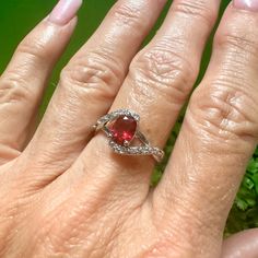 Ruby Stone Ring Accented With Crystals In 925ss Overlay Setting. Sz 9 Never Worn. Silver Teardrop Crystal Promise Ring, Silver Ruby Ring With Accent Stones As A Gift, Silver Sterling Ruby Ring With Accent Stones, Sterling Silver Birthstone Ring With Accent Stones, Sterling Silver Jewelry With Red Birthstone, Sterling Silver Ruby Ring For Anniversary, Silver Ruby Promise Ring, Red Sterling Silver Jewelry With Birthstone, Silver Sterling Silver Ruby Ring For Anniversary