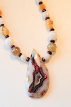 Rich Agate Necklace with magnetic closure. Luxury Agate Necklace With Colorful Beads, Hand-strung Agate Beaded Necklaces For Gifts, Unique Red Agate Necklace, Nature-inspired Agate Necklace With Cabochon, Luxury Hand-strung Agate Beaded Necklaces, Agate Necklace, Beaded Pendant, Stone Earrings, Chain Styles