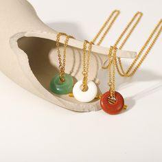 Featuring vibrant gemstones and an 18k gold-plated toggle, the Gemstone Toggle Necklace is a fusion of color and contemporary design. It's perfect for adding a bold yet elegant touch to any ensemble. Elegant Gold Toggle Necklace With Natural Stones, Elegant Toggle Necklace With Natural Stones For Gift, Elegant Toggle Necklace With Gemstone Beads For Gift, Modern Yellow Gold Jade Jewelry, Modern Jade Gemstone Jewelry, Modern Gold Jade Jewelry, Modern Necklaces With Toggle Clasp For Gift, Modern Necklace With Toggle Clasp For Gift, Modern Jewelry With Gemstone Beads For Gifts