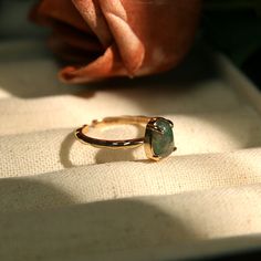 Embrace the Green Wonder: Moss Agate Ring 🌿 A Dance of Nature, a Journey through Time 🌿 Deep within the Earth, there lies a precious secret crafted by Mother Nature herself—the Moss Agate ring. This ring carries the miracles of nature, bearing witness to time, allowing you to experience the beauty of the natural world and the strength of life. Specifications: Size: Adjustable Materials: Copper Style: Glace Elegant Raw Stone Gift Rings, Gift Rings With Raw Stone, Spiritual Emerald Ring With Natural Stones For Gift, Elegant Rings With Raw Stone, Round Shape, Adjustable Emerald Ring As Gift, Adjustable Emerald Ring For Promise, Emerald Ring With Natural Stones For Gift, Gift Emerald Ring With Natural Stones, Gold Nature-inspired Emerald Ring As A Gift