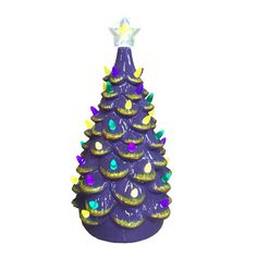 a purple ceramic christmas tree with lights on it