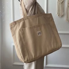 "Handmade canvas tote bag for women.  Canvas tote bags for women are really great. Check out my tote bags for the very best in unique or custom, handmade from my shop. If you want to see a different style, take a look at my collection of tote bags ⬇ https://etsy.me/3fgNzR9 🎁 WHAT IS IN THE PACKAGE * 1 piece Large canvas tote bag with zipper closure * options 📐 SIZE   * 30x41 cm/ 11,81\"x16,14\" inch Tote bags work great for any use like everyday, school, shopping, or work. Made of cotton canvas fabric. Being handmade makes it special and high quality. I sew these meticulously in my own home in Turkey and Turkish cotton material. I really love doing this. This is a handmade one. You can contact us for the color catalog. I have fabrics in khaki, pink, chocolate dark brown, red, burgundy, n Large Capacity Canvas Tote Bag For Daily Use, Eco-friendly Canvas Bag With Pockets, Eco-friendly Canvas Bags With Pockets, Beige Bags For Daily Life, Canvas Bag For Daily Use, Beige Canvas Shoulder Bag For Daily Use, Beige Canvas Shoulder Bag For Daily Life, Large Everyday Canvas Shoulder Bag, Large Beige Canvas Tote Bag