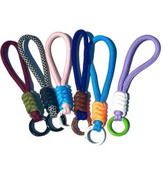 six different colored lanyards with rings attached to them