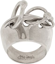 Band ring in silver-tone brass. O-rings at face. Supplier color: Silver Gothic Silver Jewelry, Aquamarine Ring Men, Jean Paul Gaultier Anatomy, Jean Paul Gaultier Jewelry, Jean Paul Gaultier Futuristic, Jean Paul Gaultier Menswear 90s, Jean Paul Gaultier 2022, Chunky Silver Jewellery, Stacked Jewelry