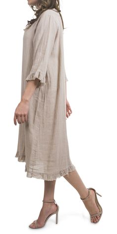 This dress is versatile and easy to use. Perfect for the beach or any other informal occasion. 75% linen 25% Cotton Made in Italy One Size Fits Most Model is 5'8 Flowy Linen Spring Dress, Flowy Linen Dress For Spring, Linen Beach Dress For Spring Day Out, Spring Linen Beach Dress For Day Out, Beige Cotton Linen Dress For Vacation, Spring Day Out Linen Beach Dress, Spring Vacation Lagenlook Linen Dress, Flowy Linen Dresses, Unlined, Flowy Linen Dresses Unlined