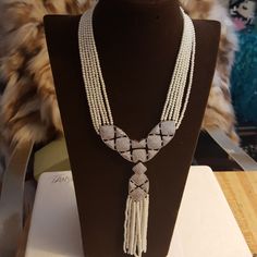 6 Rows Of Authentic Pearls Coupled With A Rhinestone Pendant Which Cascades Down To Multi Tassels Of Pearls. Long Necklaces, Jewelry White, Jewelry Pearl, Pearl Jewelry, Long Necklace, Womens Jewelry Necklace, The Row, Tassels, Color White