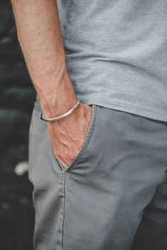 This handmade cuff bracelet is made from solid sterling silver. Our Heavy Cuff goes well with everything from jeans and a t-shirt to pairing with other jewelry for a night on the town. You can't go wrong with this simple statement cuff.Cuff is slightly adjustable by bending to shorten or widen the gap of the bracelet.Male model is wearing a large sized bracelet.Female model is wearing medium sized bracelet.To find your cuff size, measure your wrist and find where that measurement falls in our ch Timeless Sterling Silver Bracelet For Everyday, Adjustable Sterling Silver Bracelet With Polished Finish For Everyday, Classic Adjustable Cuff Bracelet For Everyday Wear, Modern Sterling Silver Cuff Bracelet For Everyday, Classic Engraved Sterling Silver Bracelet For Everyday Use, Modern Cuff Bracelet For Everyday Wear, Modern Cuff Bracelets For Everyday Wear, Classic Silver Bracelet For Everyday Wear, Modern Cuff Jewelry For Everyday