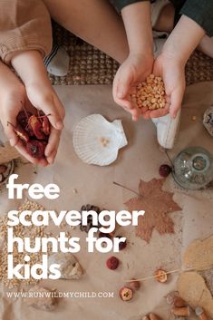 two children are holding their hands over the ground with nuts and other things on it