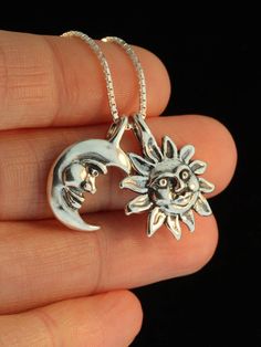 "This unique two part Eclipse Pendant is cast in solid sterling silver. The Moon gently embraces its companion the Sun and they nestle together on the chain. Either charm can also be worn separately, so this design gives you three style variations. The combined pendant is 3/4\" high. Indulge in a piece of our solar system. All Marty Magic Charms and Pendants include an 18 inch (46cm) box chain. If you would prefer a different length of chain please feel free to contact me. This item usually ship Celestial Sun And Moon Sterling Silver Necklace, Sterling Silver Sun And Moon Spiritual Necklace, Sterling Silver Spiritual Necklace With Sun And Moon Design, Spiritual Sterling Silver Sun And Moon Necklace, Spiritual Sterling Silver Necklace With Sun And Moon Design, Sterling Silver Crescent Necklace With Charms, Silver Celestial Jewelry With Sun And Moon Design, Sterling Silver Moon-shaped Charms Necklaces, Sterling Silver Sun And Moon Jewelry