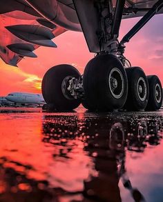 an airplane is parked on the tarmac with its wheels still attached to it's tires