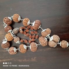 "Introducing the Siddha Mala, a powerful healing Rudraksha mala that can help you achieve success and prosperity in all areas of life. This divine mala is composed of various Rudraksha beads, each with its unique benefits. सर्वेषामपि वक्त्रणां धारणे यो समो भवेत् तस्मात्सर्व प्रयत्नेन रुद्राक्ष पुत्र धारय - पद्मपुराणे \"One who wears all mukhi Rudraksha becomes equal to me (Shiva). So dear Son, one should try by all means to wear all mukhi Rudraksha.\" -Padma Puran भक्तिश्रद्धायुतश्चैव सर्वकामार् Traditional Mala With Gemstone Beads For Healing, Handmade Spiritual Mala For Puja, Spiritual Gemstone Beads Mala For Puja, Spiritual Gemstone Mala For Puja, Hand-strung Spiritual Mala For Puja, Silver Spiritual Mala For Puja, Handmade Spiritual Mala For Rituals, Hand-strung Spiritual Necklace For Puja, Spiritual Hand-strung Necklaces For Puja