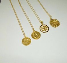 A nice 14k gold filled necklace with an eye catching Christian Pendant. A dainty everyday charm that brings good luck and protects the person that is wearing it. A nice gift for her Length approx. 16 inches / 40.5 ♥ All items will come in a nice gift box ♥ ★ Read our policies before purchase: https://www.etsy.com/shop/Jewellusion/policy/ ★ Convo me for custom orders or any questions you might have ♥ Visit our shop for more fabulous jewels: https://www.etsy.com/shop/Jewellusion/ ♥ Follow me on Pi Plated Medallion Jewelry Gift, Medallion Shaped Plated Jewelry Gift, Byzantine Style Gold-plated Round Jewelry, Handmade Byzantine Round Necklace, Handmade Byzantine Style Necklace, Byzantine Round Pendant Necklace For Gift, Handmade Byzantine Sterling Silver Necklace, Byzantine Style Round Pendant Necklace For Gift, White Gold Byzantine Jewelry Gift