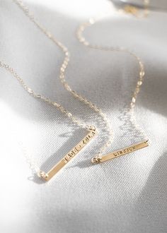 · 1.5" bar· 14k yellow gold fill, 14k rose gold fill, and sterling silver options· Sturdy, timeless, and built to be worn everydayOur narrow bar necklaces make for the perfect everyday piece, personalized with your most special sentiments, moments, and memories! Created to last a lifetime, these necklaces will remain evergreen even as the years and trends come and go.Personalizing your piece with a message? Reference our fonts and symbols chart for font options and character maximums!Please note Minimalist 14k Gold Filled Necklace For Personalized Gift, Personalized 14k Gold Necklace For Everyday, Personalized Minimalist 14k Gold-filled Necklace, Minimalist Personalized 14k Gold Filled Necklace, Personalized Minimalist 14k Gold Filled Necklace, Minimalist Engraved 14k Gold Filled Jewelry, Delicate Everyday Jewelry With Custom Name, Personalized Minimalist Gold Necklace, Classic Everyday Customizable Necklaces