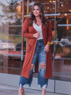 Take on any fall day in these stunning Spiced Up Cardigan featuring soft lightweight material, long sleeves, front pockets, and a draped open front silhouette that fall into a straight calf-length hemline! Color: Rust Long cardigan pockets Fabric: 36% Rayon, 30% Cotton, 30% Acrylic, 4%SpandexSmall fits 2-4Medium fits 6-8Large fits size 10-12XL fits size 14-162XL fits size 18-20Length: 45" Long on Size Medium Rust Cardigan, Pocket Cardigan, Fall Day, Long Blonde Hair, Color Fabric, Autumn Day, Long Sleeve Cardigan, Long Cardigan, Spice Things Up