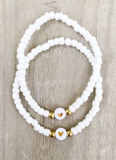 White Heart Friendship Bracelets 🤍🤍 Simple and cute! Perfect to add to any stack. Match with your best friend or group of friends ✨✨ CARING TIPS FOR YOUR JEWELRY ⭐️Treat and store with care. ⭐️ For longevity, avoid exposing your jewelry to water. ⭐️ Avoid having direct contact with lotions, perfumes, sanitizers as these chemicals may cause discoloration of your jewelry. Cheap White Friendship Bracelets, Cheap White Friendship Bracelets With 8mm Beads, Casual White Beaded Bracelet For Best Friend, White Hypoallergenic Friendship Bracelets For Everyday, Cheap Beaded Bracelets For Best Friend Gift, White Beaded Bracelets With Letter Beads For Jewelry Making, White Beaded Bracelets For Jewelry Making With Letter Beads, White Tiny Beads Friendship Bracelets For Jewelry Making, Handmade White Friendship Bracelets For Everyday