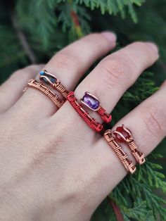 This ring combo is made of 3 handmade wire-wrapped copper rings: - Red agate ring - Purple glass red ring - Abalone shell ring These rings are all adjustable and made from 2 types of copper, raw and varnished. -Tarnish-proof and won't leave green marks on your finger. -To clean, dip the ring for 5 seconds in a mixture of vinegar and salt, then rinse with water and dry well. -suggested not to swim or shower with the rings on regardless. *These rings are sold as a set, you will get all 3 if purchased. Check these listings out: Red agate necklace: https://www.etsy.com/listing/1474737144 Amethyst necklace: https://www.etsy.com/listing/1387983713 Other rings set: https://www.etsy.com/listing/1661783772 Have any questions? Be sure to message me :) Check out my Instagram profile: @bronzaii.jewelr Handmade Adjustable Crystal Promise Ring, Handmade Adjustable Stackable Rings As Gift, Handmade Crystal Metal Ring As Gift, Unique Handmade Adjustable Stackable Rings, Handmade Metal Crystal Ring Gift, Handmade Metal Stackable Rings For Jewelry Making, Adjustable Hand Wrapped Stackable Rings For Gifts, Handmade Metal Crystal Ring As Gift, Adjustable Wire Wrapped Stackable Rings As Gift