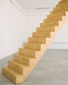 a set of stairs in an empty room