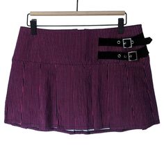 Current Mood Women's "Feeling The Blues" Magenta Black Pinstripe Mini Skirt Features: This Mini Skirt Comes With Belt Buckle Details, Pleating Details, And A Pinstripe Pattern. Non-Stretch Waist. Condition: New With Tags (Nwt) No Wear No Flaws Smoke-Free Pet-Free Size: L Measurements: Length: 13.5" (Mini Fit) Waist: 16" Hip: 19" Color: Dark Magenta / Black Material: 76% Viscose 21% Polyamide 3% Elastane Care: Hand Wash Cold No Bleach Dry Flat Iron Low Do Not Dry Clean Made In China About Me: I A Pastel Goth Fitted Skirt, Fitted Edgy Purple Bottoms, Edgy Fitted Purple Bottoms, Pink Punk Bottoms For Spring, Y2k High Waist Pink Skirt, Pink Fitted Mini Skirt Y2k Style, Pink Pastel Goth Bottoms For Summer, Pastel Goth Pink Bottoms For Summer, Pastel Goth Pink Mini Skirt