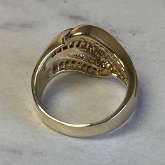 A stunning 14kt Yellow Gold Lady's Cubic Zirconia Baguette Channel Set Band with 1.50ct approx. total weight of all channel set straight baguette Cubic Zirconia (CZ) stones in finger size 7. This ring can be resized for an additional $95.00 upon request. The ring weighs 7.25 grams. Excellent band as a Wedding/Anniversary Gift. This item would Retail for $1,279.00 Baguette Diamond Marquise Cut Jewelry, Dazzling Gold Diamond Ring With Baguette Diamonds, Gold Dazzling Diamond Ring With Baguette Diamonds, Gold Baguette Diamond Ring In Dazzling Style, Elegant Oval Diamond Ring With Baguette Diamonds, Yellow Gold Jewelry With Baguette Cut Diamonds, Formal Yellow Gold Diamond Ring With Baguette Diamonds, Gold Baguette Cut Diamond Ring, Oval Gold Rings With Baguette Diamonds