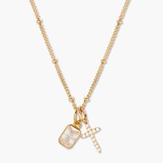 Add a touch of personalization to your jewelry collection with the Josephine Cross Birthstone Necklace. Featuring a delicate gold chain and a stunning cross charm, this necklace also includes a birthstone charm of your choice. Show off your unique style with this must-have accessory! Josephine Cross Necklace: Available in 14k gold vermeil, Charm size: 1/4"x1/2", 1mm white CZ, Length: 16" brass satellite chain with 2" extender Mackenzie Birthstone Charm: 1/8"x1/4" charm, 5mm Cubic Zirconia Lobste Yellow Gold Birthstone Cross Pendant Necklace, Yellow Gold Cross Pendant Necklace With Birthstone, Gold Necklace With Gemstone Cross Pendant, Gold Necklaces With Gemstone Cross Pendant, Yellow Gold Charm Necklaces With Cross Pendant, Tennis Jewelry, Cross Charms, Birthstone Charms, Custom Necklace