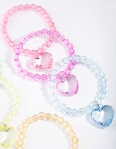 Description
There is nothing more fun than dressing up as a unicorn or sharing a necklace with your BFF. This range is perfect for little ones with big imaginations. This kids multi coloured bead heart bracelet pack is perfect for sharing with besties! 
Diameter: 5cm Bead Heart, Bracelet Pack, Fashion Jewellery Online, Bold Earrings, A Unicorn, Earrings Rings, Rings Necklaces, Favorite Rings, Nose Piercing