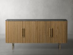 the sideboard is made from wood and has two doors, one with black marble top