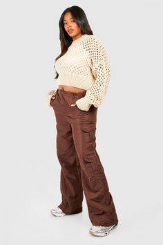 Womens Plus Wide Leg Cargo Pants - Brown - 14 - Take military-inspired styling to the next level with these cute cargo pants. Typically cuffed at the ankle, these loosely cut cargo pants for women might be a new addition to our everyday closet, but they're one we will be keeping around. Featuring heavy pocket detailing ideal for carrying your things, these cargo pants' casual styling and comfortable fit give us inner-city streetwear vibes, and we can't get enough.Style: Cargo PantsFabric: Woven Chocolate Brown Cargo Pants Outfit, How To Style Brown Cargos, Maroon Cargo Pants Outfit, Brown Cargo Pants Outfit, Cute Cargo Pants, City Streetwear, Cargo Pants For Women, Brown Cargo Pants, Wide Leg Cargo Pants