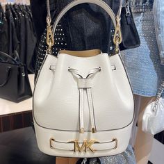 Michael Kors Reed Medium Pebbled Leather Bucket Bag Satchel Crossbody Handbag Optic White Nwt New With The Tag Authentic The Reed Infuses Glamor Into An Otherwise Austere Bucket Bag Design. Crafted From Smooth Leather, It Features A Drawstring Closure That Opens To A Spacious Interior. A Belted Feature With Our Gold-Tone “Mk” Hardware And Coordinating Accents Finish It With A Gilded Touch. Carry It By The Top Handle Or Wear It Crossbody With The Removable Strap. Bucket Bag Pebbled Leather 100% L White Leather Satchel With Gold-tone Hardware, Luxury White Pouch Shoulder Bag, Luxury White Pouch Satchel, White Crossbody Shoulder Bag With Gold-tone Hardware, White Shoulder Bag With Gold-tone Hardware And Double Handle, White Shopping Bag With Gold-tone Hardware, White Shopping Bags With Gold-tone Hardware, Luxury White Bucket Bag With Double Handle, White Shoulder Bucket Bag