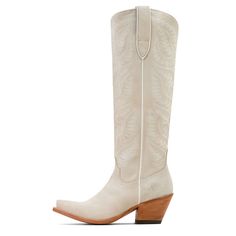 Endlessly wearable and effortlessly stylish, this tall boot looks just as good with jeans and a sweater as it does with dresses and skirts. Bonus: StretchFit allows it to fit a wide range of calves. Laramie StretchFit Western Boot | Product Features : 0 : ATS® technology provides ergonomic support on uneven terrain, 1 : StretchFit panels under the pull tabs give an additional inch to fit a wide range of calves, 2 : Hand-nailed vegetable-tanned leather sole is supremely durable, 3 : Resoleable Go Luxury Cream Cowboy Boots For Women, Cream Western Boots With Reinforced Heel, Cream Leather Western Heeled Boots, Cream Ankle-high Western Boots, Western White Snip Toe Knee-high Boots, Tall Boot, Western Boot, All Colors, Tall Boots