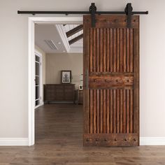 an open wooden door in a white room